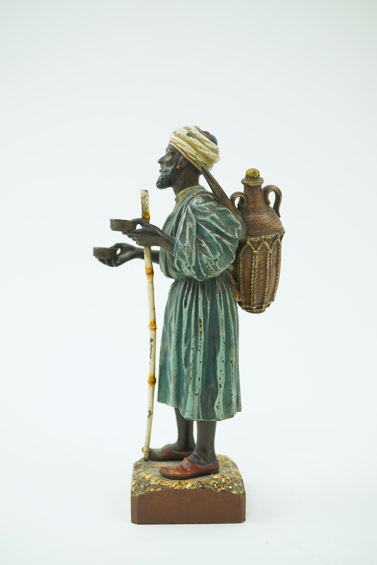 Franz Xavier Bergman (Austrian, 1861-1936). A Viennese cold painted bronze figure of a North African street vendor
